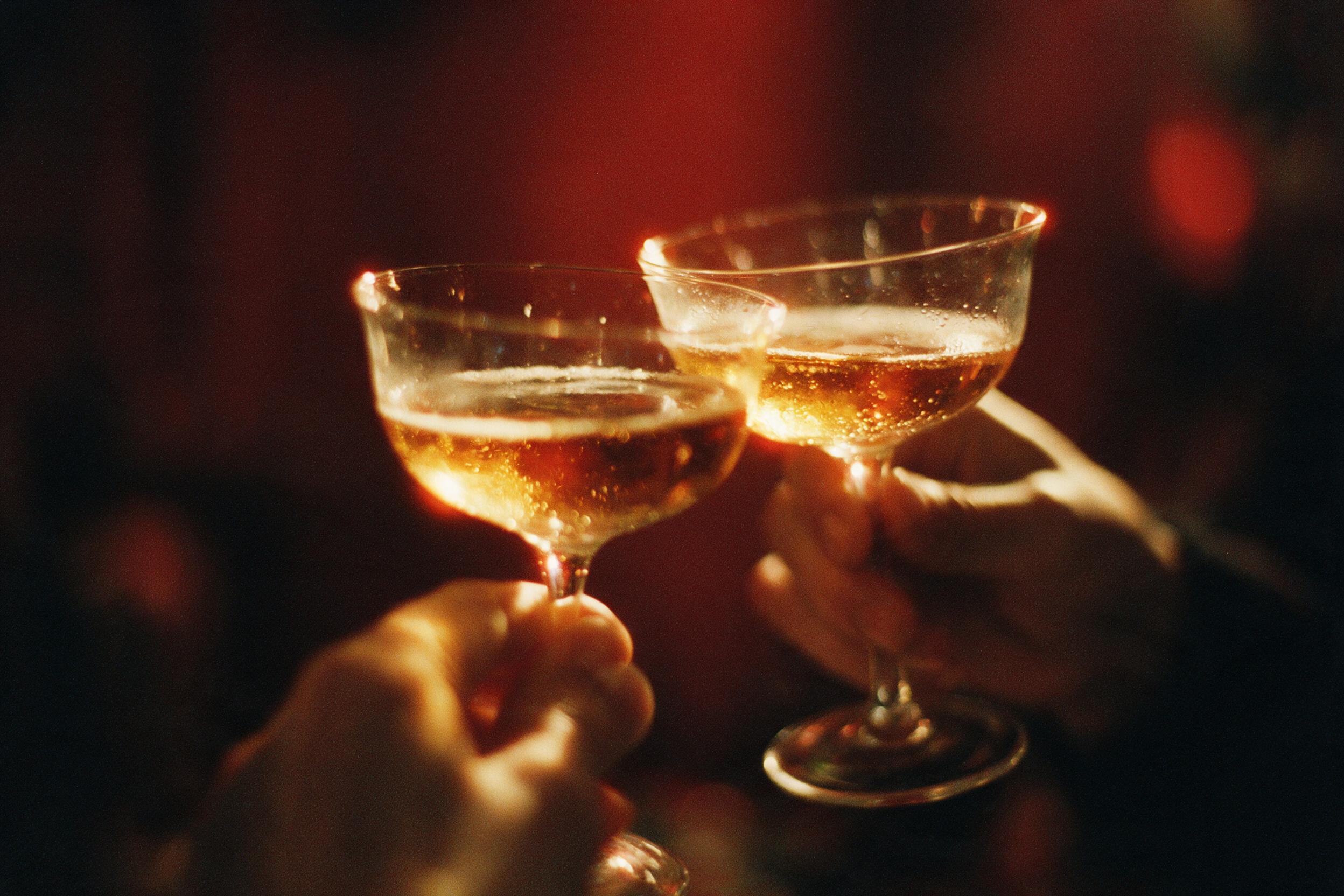 A toast raised under the red light